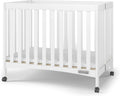 Child Craft London Mini Compact Folding Portable Crib with 2” Crib Mattress and 2 Easy Roll Locking Wheels, Durable Pine Wood Construction (Matte White)