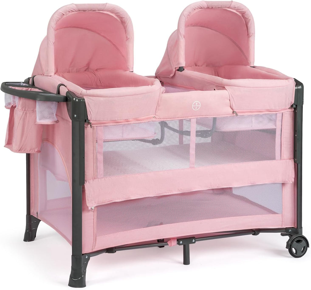 JOYMOR Twin Bassinet for Baby, Pink Bedside Bassinet, Convertible to Bedside Sleeper and Playpen, with Wheel, Brake, Foldable Side Sleeper