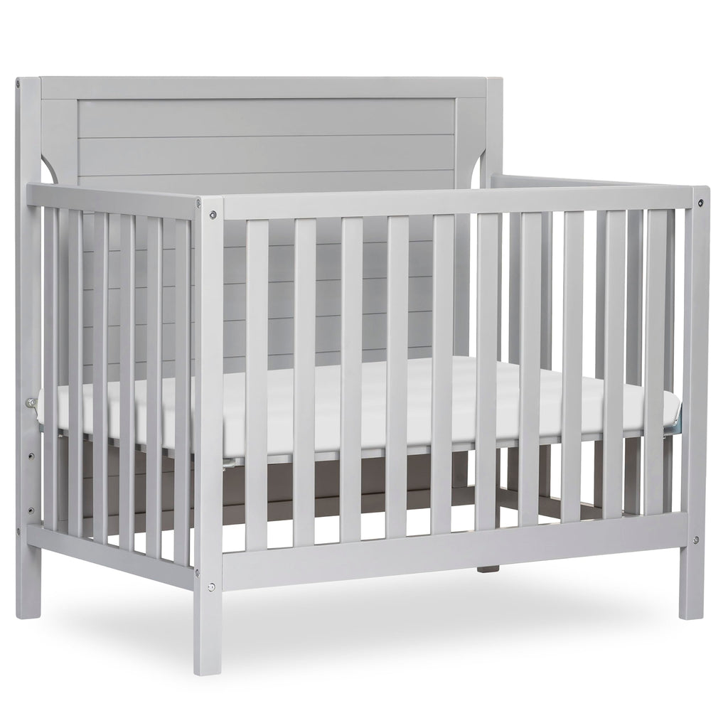 Dream On Me Bellport 4-in-1 Convertible Mini Baby Crib, Compact Design in Safari Green, GreenGuard Gold & BSA, Non-Toxic, Pinewood, Converts to Mini Daybed & Twin Bed, 1″ Mattress Pad