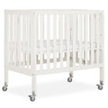 Dream On Me Jett Mini Folding Baby Crib in Pebble Grey, GreenGuard Gold & BSA, Lightweight & Portable, Patented Flat Folding System, Small Spaces & Travel, 1.5” Mattress Pad, 3 Heights, Safe Wheels