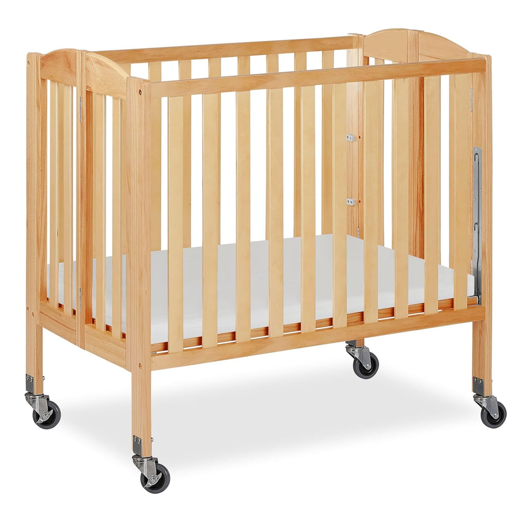 Dream On Me 3-in-1 Portable Mini Baby Crib in Natural, GreenGuard Gold & JPMA, Birchwood, Quick Fold Patent, Playpen or Changer, Storage or Travel, Heavy Duty Steel Castors, 3 Heights, 1″ Mattress Pad