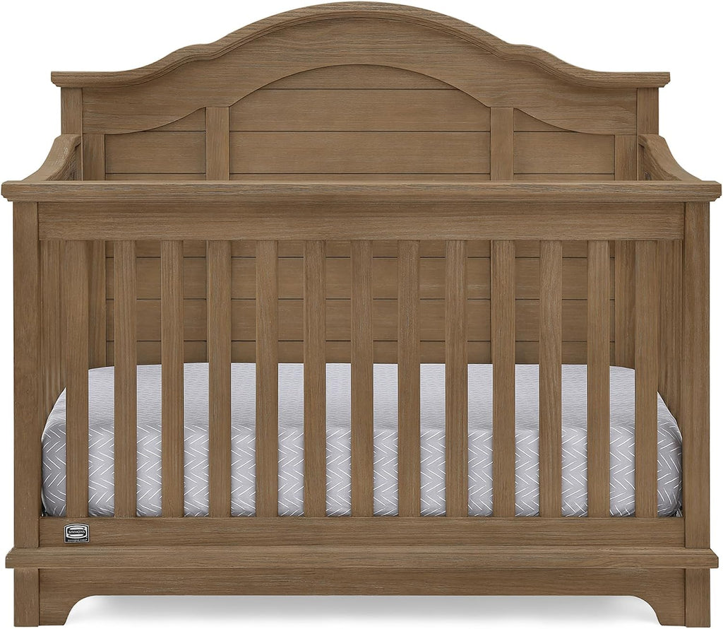 Delta Children Simmons Kids Asher 6-in-1 Convertible Crib with Toddler Rail, Aged Oak