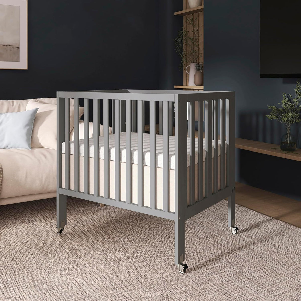 Dream On Me Jett Mini Folding Baby Crib in Pebble Grey, GreenGuard Gold & BSA, Lightweight & Portable, Patented Flat Folding System, Small Spaces & Travel, 1.5” Mattress Pad, 3 Heights, Safe Wheels